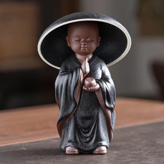 Little monk checking for leaks